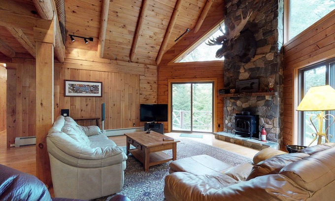 Greenville Junction Cabin | LogHome on Moosehead Lake w/Seasonal Dock, Pebble Beach, Firepit & Spacious Deck