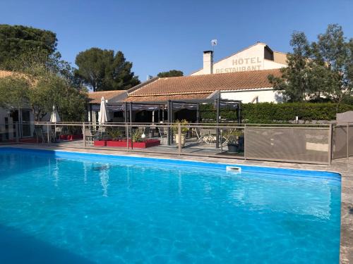 Caissargues Hotel | Logis Hôtel Restaurant Les Aubuns
