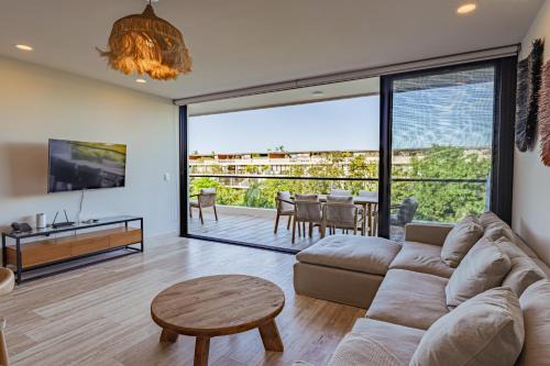 Playacar Apartment | Lush Escape at Awa Playacar