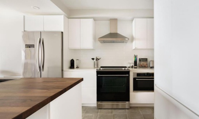 Mont-Tremblant House | Luxury Condominium with Rustic Minimalist Style