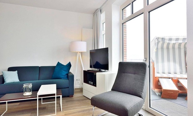 Wangerooge Apartment | Modern apartment on the beach with great sea views, balcony and beach chair! -