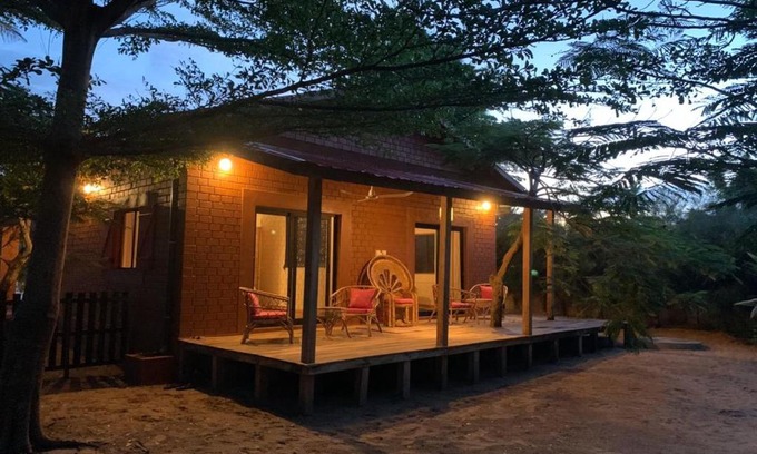 Ouidah Villa | Natura luxury red house