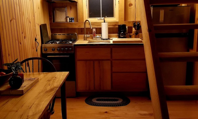 Craftsbury Cabin | Northwoods Guest Cabin & porch overlooking private woods and stream