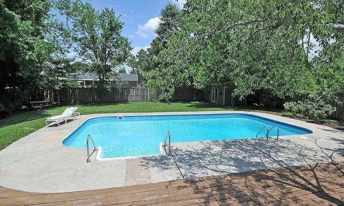 Wilmington House | Oasis in the middle of town for large groups with pool and 2 Master bedrooms.