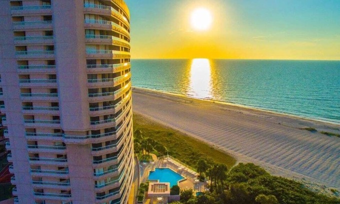 Sand Key Apartment | Oceanside Treasure by GoldenCoastRentals