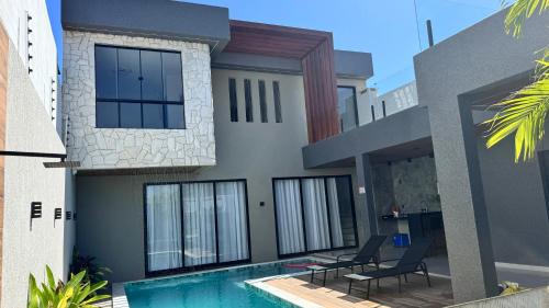 Aruanda House | Pôr do sol house