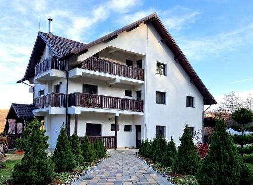 Radaseni House | Pensiunea Izvorul Liniștii