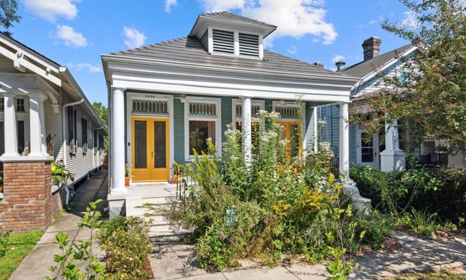 Uptown Historic District House | Porch Swing, streetcar, big backyard, Oh my!