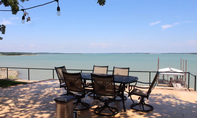 Runaway Bay House | PRIVATE, SECLUDED LAKEFRONT RETREAT WITH BOAT DOCK, LARGE PATIOS AND HOT TUB!