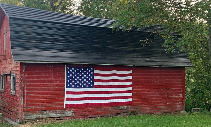 Babcock House | Relax by the river in this 4 bedroom house with firepit- spot our river eagle!