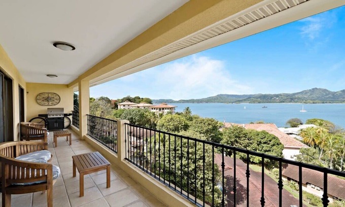 Playa Flamingo Condo | Remodeled Top-Floor Condo with Stunning Wrap-Around Balcony Offering Mountain, O