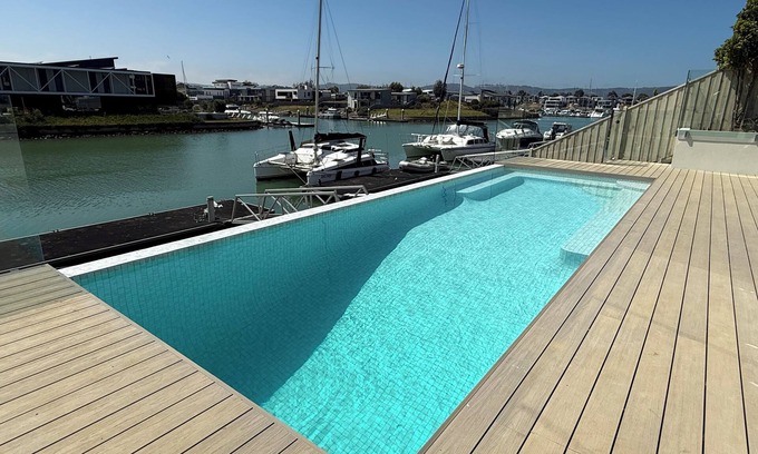 Safety Beach House | Resort style waterfront living - waterfront swimming pool and private jetty.