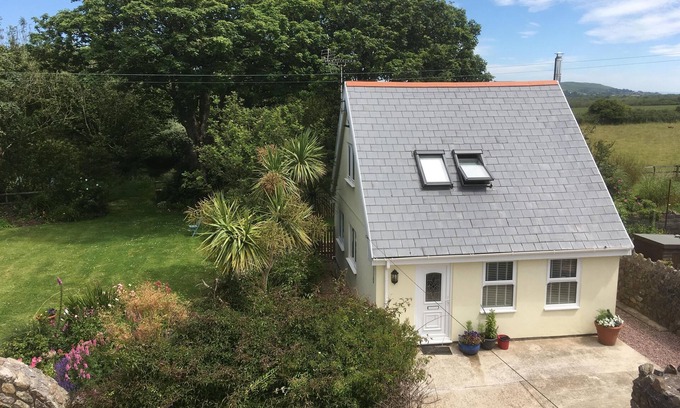 Scurlage Cottage | Rural location, surrounded by farmland, ancient green lanes, footpaths & woods.