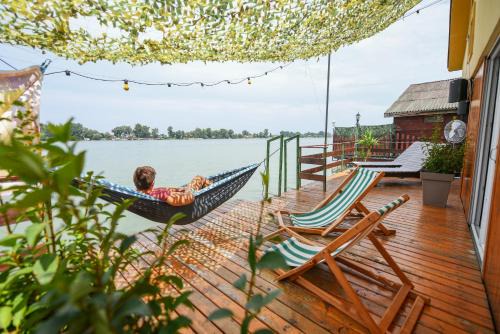 Cukarica Boat Rental | Sagando - Floating house on Sava river