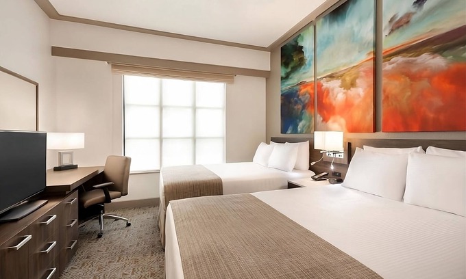 Florida Central Atlantic Coast Hotel | Spacious 2 Queen Suites in Orlando – Private Pool & Close to Disney