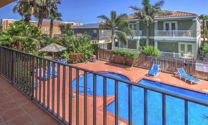 South Padre Island Condo | Spacious oasis near the beach with balcony, pool & hot tub