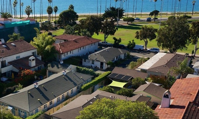 East Beach Cottage | Steps to the Sand: Enjoy beach views & a private fenced yard. Great for families