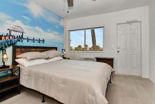 Daytona Beach Shores Hotel | Studio Suite Queen Bed Kitchen Walk In Shower #5