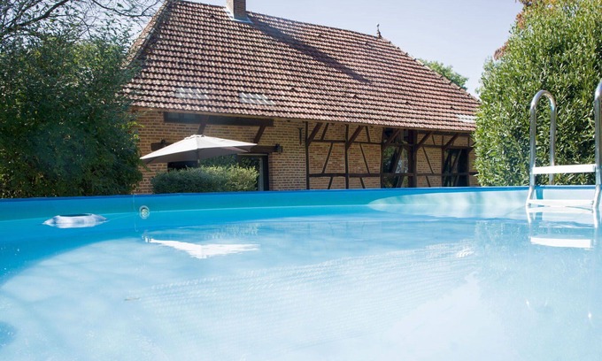 La Chapelle-Saint-Sauveur Villa | Stunning private villa for 8 guests with WIFI, private pool, TV, terrace and pets allowed