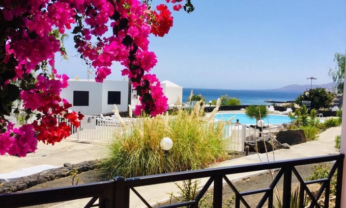 Puerto del Carmen Apartment | Stunning 2 bedroom apartment located on the seafront opposite the main beach