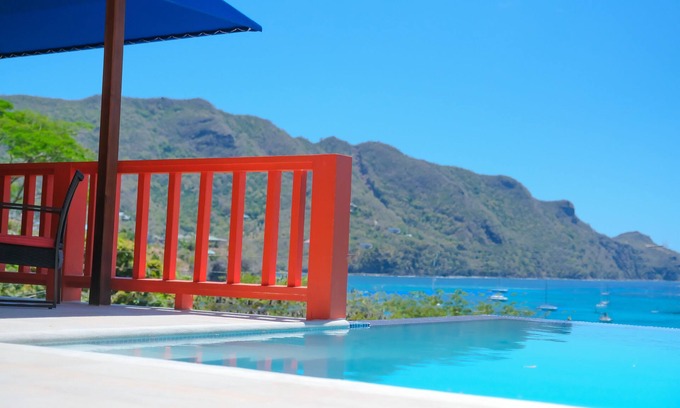 Richmond Villa | Stunning Beachfront Sunset Flamingo 4 Bedroom Villa sleeps 8 With Private Pool