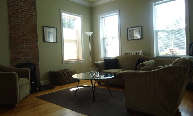 Queens Square Apartment | Stylish Downtown Historic District Suite Near Water Front & Convention Centre