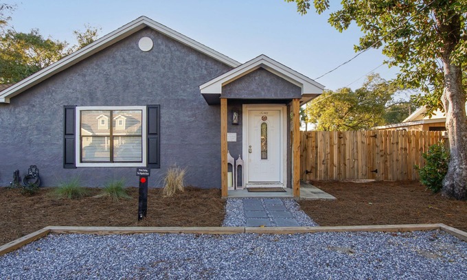 Panama City House | The Bay House - Pet Friendly! Basketball court, firepit - Walk to the Bay!