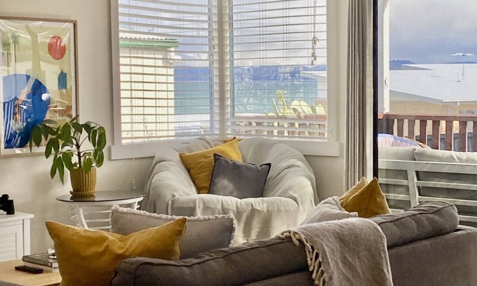 Primrose Sands Apartment | The Lazy Fig - Ocean Views, Orchard & Pizza Oven