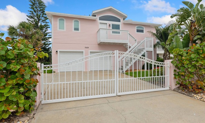 Palm Coast House | Tropical Elegance Meets Coastal Adventure at This Stunning Beachfront Retreat!