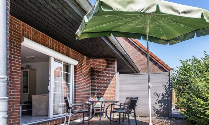 Carolinensiel House | Vacation home 50009 - Timeless and elegant: The semi-detached house impresses both