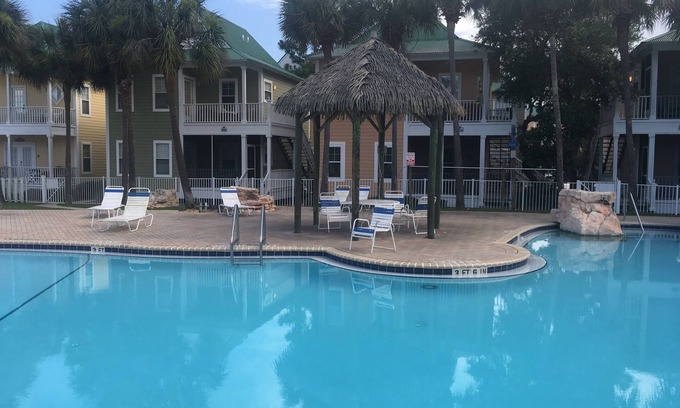 Ono Island Condo | Vacation Paradise at Purple Parrot Resort Relax at the Tiki Bar New on