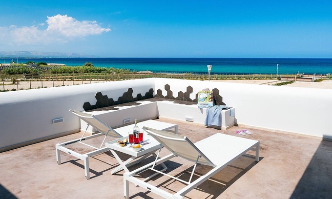 Reitani Villa | Villa rental in Sicily seaside with pool, AC, Wi-Fi, and walk to town