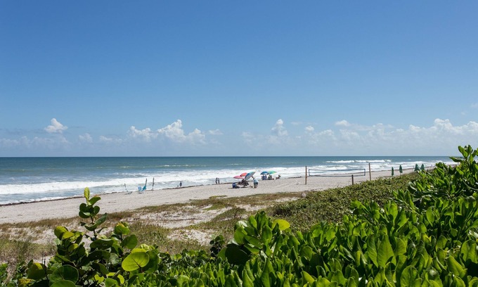Melbourne Beach House | WALK TO BEACH AND HEATED POOL! Beachside Paradise One Block from Ocean!
