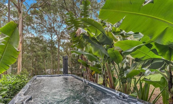 Murrays Beach House | Wallarah Forest Stay - heated swim spa and resort style grounds