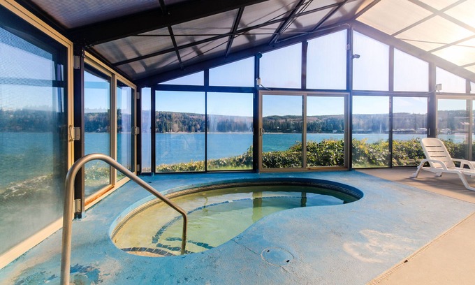Port Ludlow Condo | Water-view condo with deck, grill, yard games, resort pools, hot tub, and gym