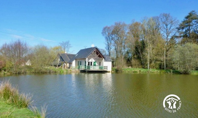 Saint-Ellier-du-Maine Cottage | Waterfront Fishing Cottage with Terrace and Scenic Views