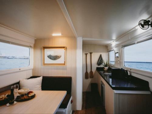 Victoria and Alfred Waterfront Boat Rental | Waterfront Houseboat