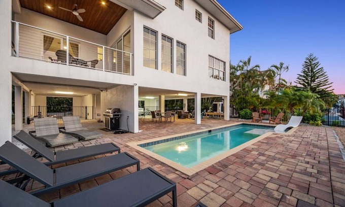 South Island House | Waterfront Luxury | Walk to Beach | Heated Pool