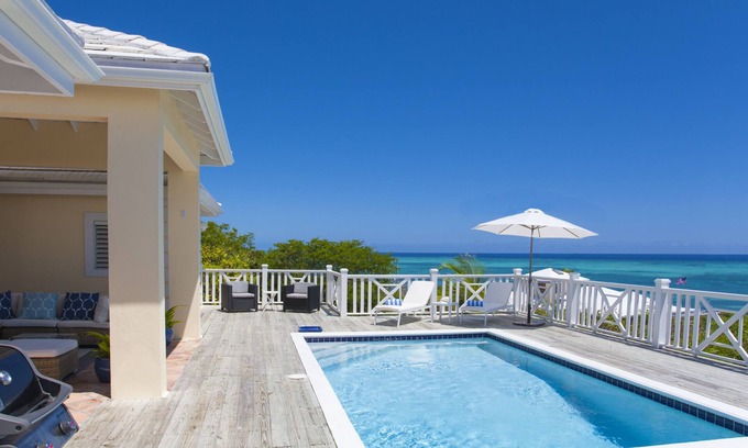 Providenciales Villa | White Osprey: Spectacular views from every room and pool overlooking the ocean