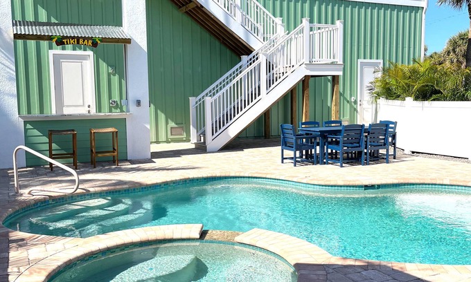 Mid Island House | Your perfect beach getaway! Pool, Tiki Bar, Gulf-side, Ocean!