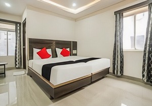 Capital O75502 Hotel Asian International