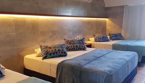 Quarto família 6, vista frente oceano