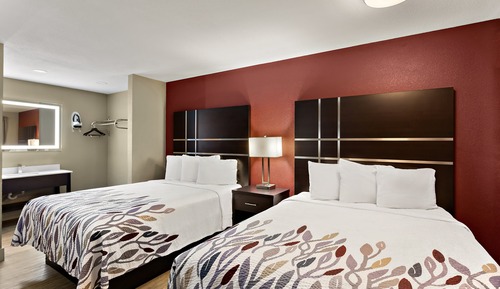 Deluxe Room (3 Queen Beds, Smoke Free)