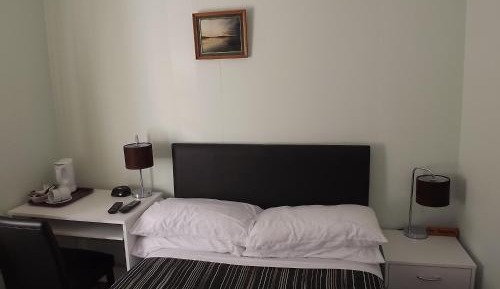 Single / Small Double Room (2 Adults)