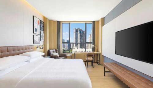 Comfortable King Guest Room with City View