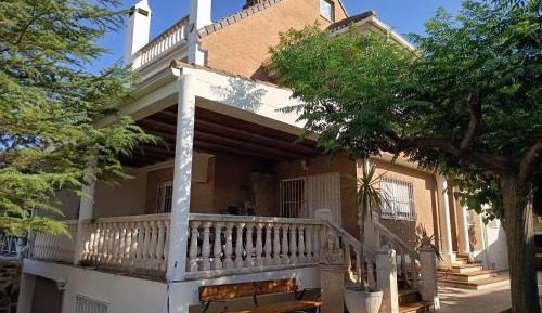 Six-Bedroom House