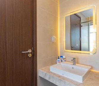One-Bedroom Apartment with Balcony and City View