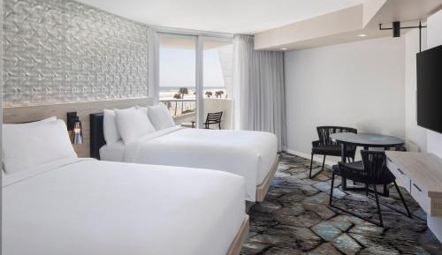 Queen Room with Two Queen Beds, Sofa Bed and City View