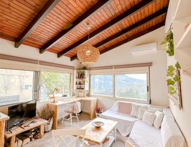 One-Bedroom Apartment with Balcony and Mountain View  