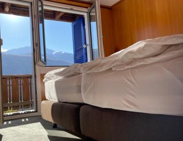 Double or Twin Room with Balcony and Mountain View